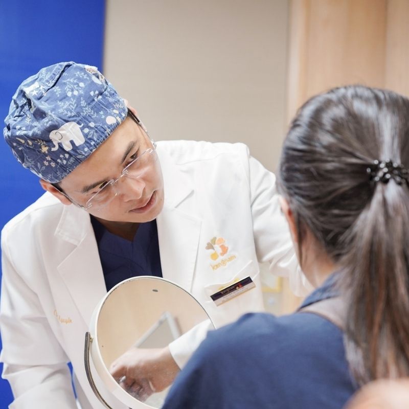 Dr. Harvey Nguyen conducts consultations for clients.