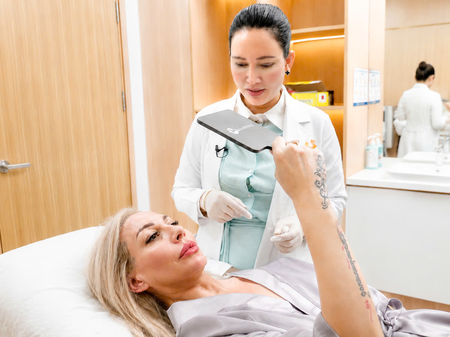 Dr. Jolie Huynh performs a medical-standard lip filler procedure for Amanda. 