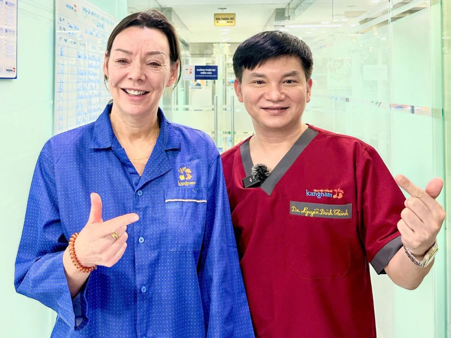 Client Julia and Dr. Eric Tran before entering the operating room. 