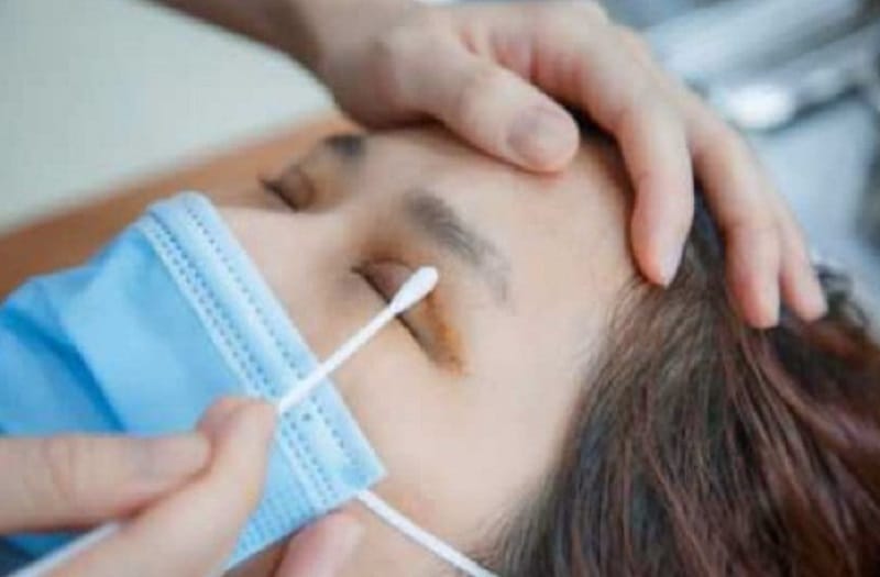 Sterile saline and a clean cotton swab may be used to remove dried discharge around the incision.
